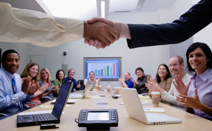business people clapping hands for a winning business case
