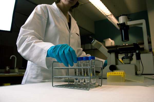 Image of chemist working in lab